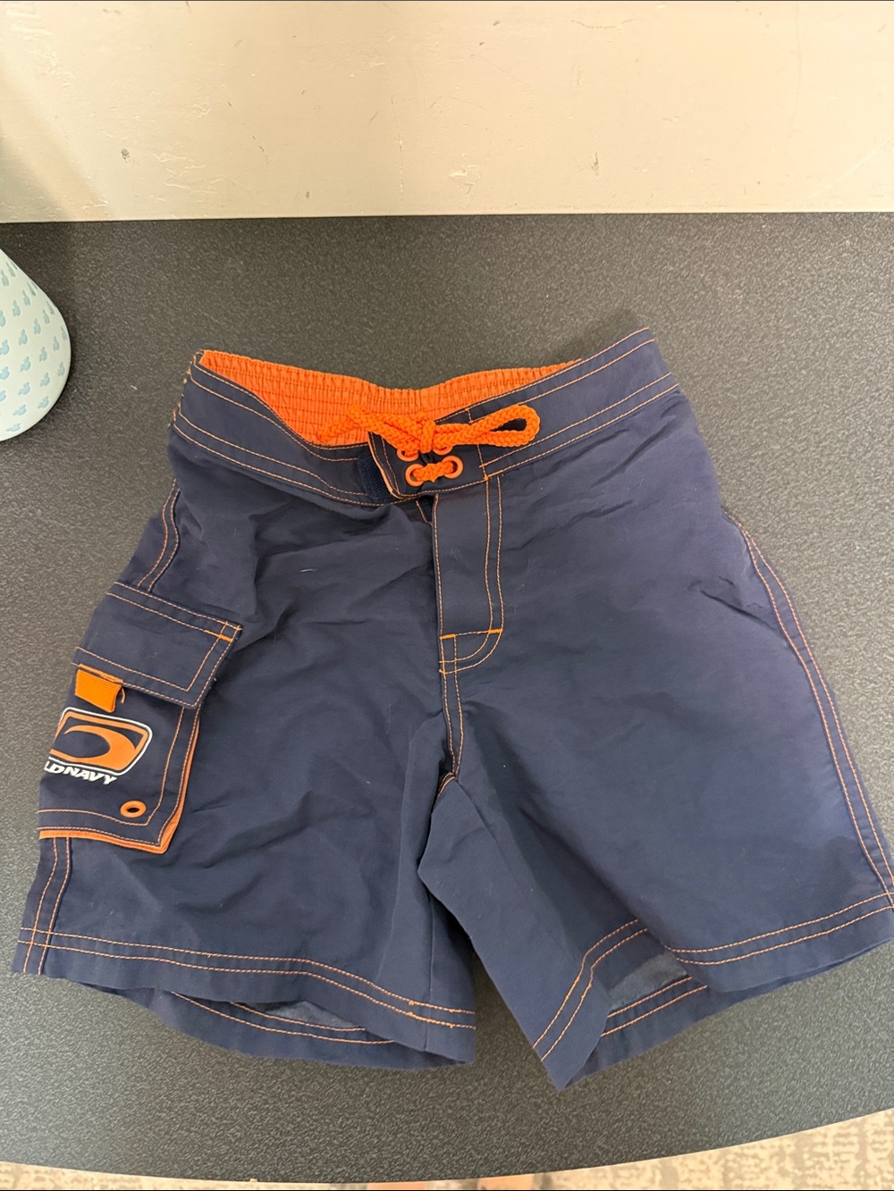 Old Navy Navy and Orange Boys' Swim Trunks dated 2001